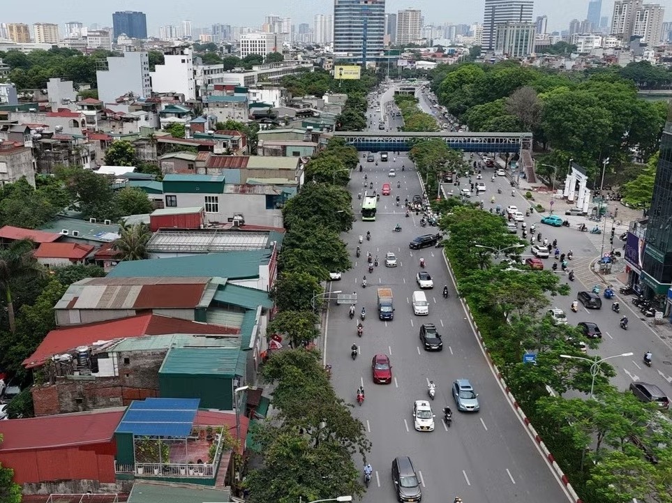 Ha Noi thu hoi dat 110 ho dan mat duong Dai Co Viet lam bai do xe hinh anh