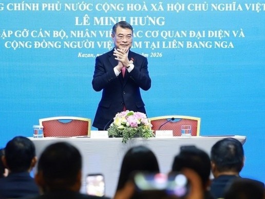 Thu tuong Le Minh Hung gap cong dong nguoi Viet Nam tai Nga hinh anh