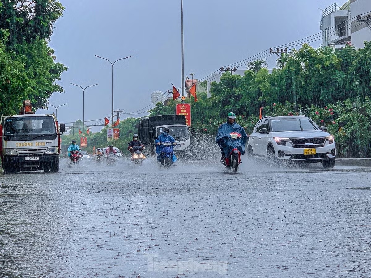 mưa lớn mở rộng ảnh 1