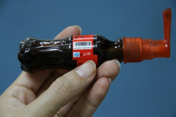 Coca-Cola khong ban chai sieu nho gia 2.000 dong hinh anh
