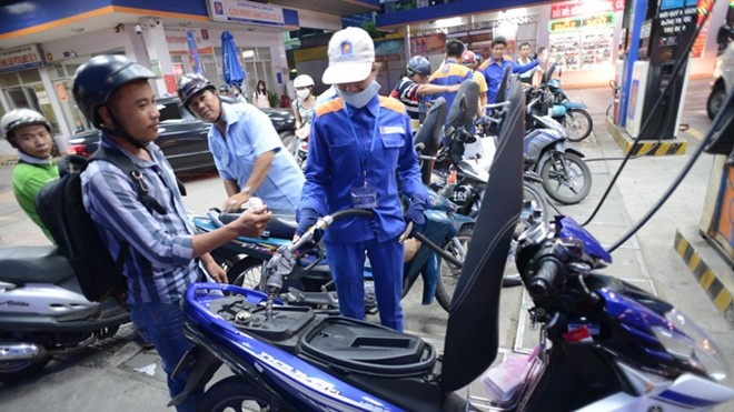 Doanh nghiep xang dau lai bao lo hinh anh