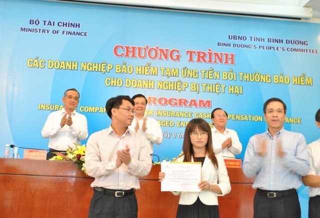 Chi 114,7 ty dong tam ung boi thuong doanh nghiep thiet hai hinh anh