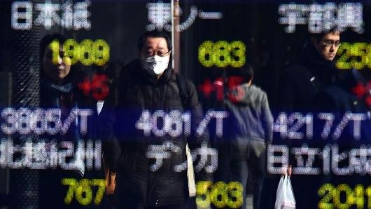 Gia dau giam, chung khoan toan cau tut doc hinh anh