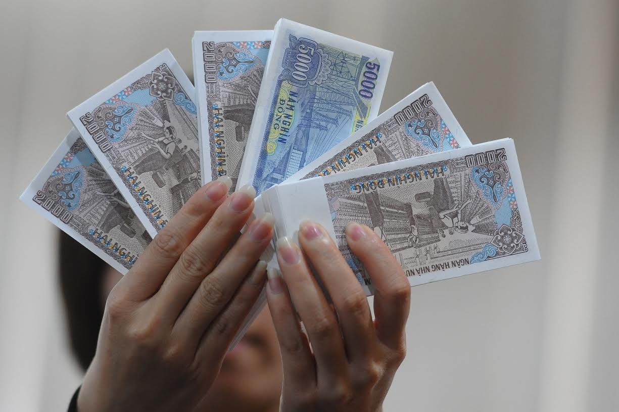 Phi doi tien 500 dong moi len den 100% hinh anh