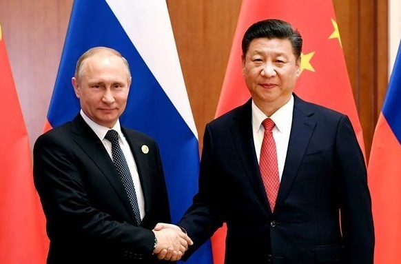 Ong Putin va ong Tap nhat tri tang cuong quan he Nga - Trung hinh anh