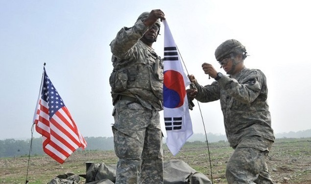 Trieu Tien yeu cau My cham dut 'thong tri' Han Quoc hinh anh