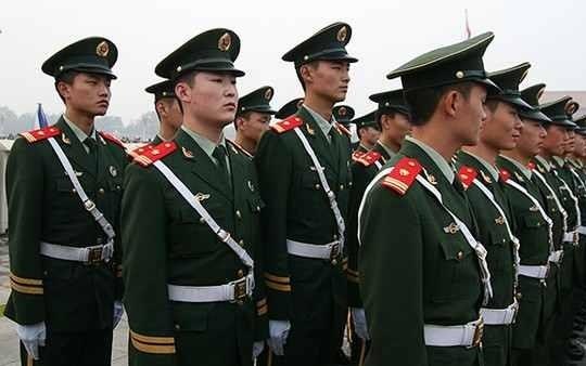 Trung Quoc sap nhap luc luong canh sat vu trang vao quan doi hinh anh