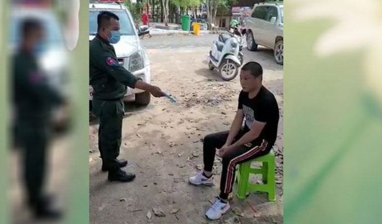 Mot nguoi dan ong Trung Quoc bi cam cua vinh vien o Campuchia hinh anh