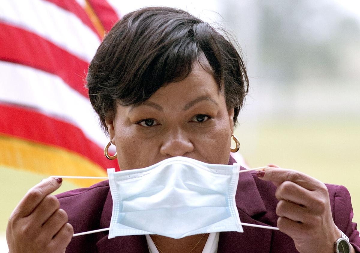 Thanh pho cua My khuyen nguoi dan mang khau trang tro lai hinh anh