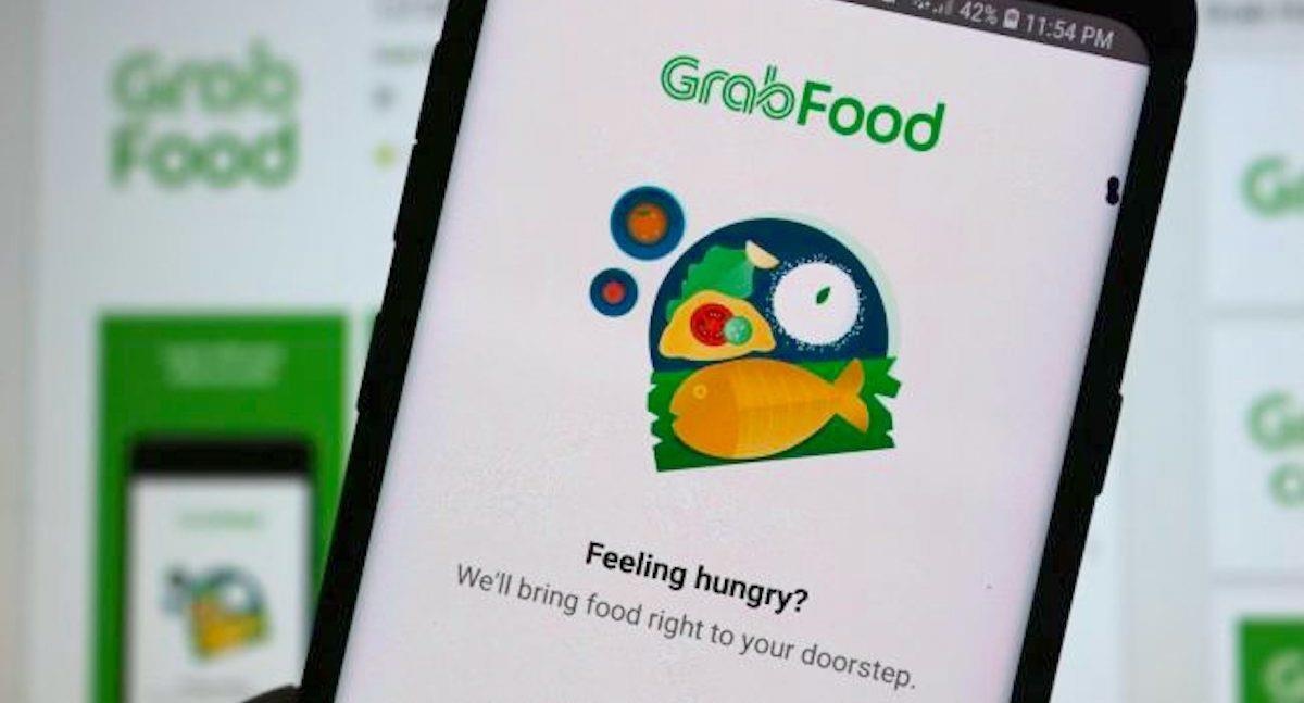 Sau vu 'bung don' 20 ly tra sua, Grabfood se khoa tai khoan de ran de hinh anh