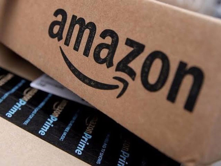 Mot nhan vien Amazon nhiem Covid-19 khi di lam giua dich hinh anh