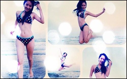 Khanh Thi mac bikini khoe dang dep hinh anh