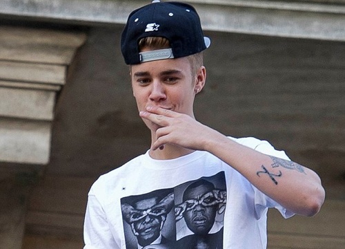 Justin Bieber chinh thuc giai nghe hinh anh