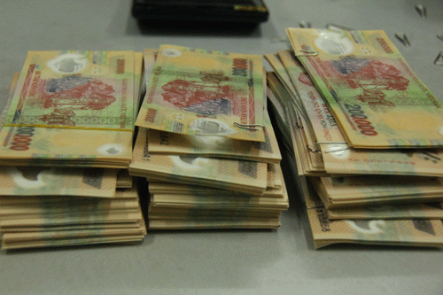 Bat nhom mua ban, tieu thu tren mot ty dong tien gia hinh anh