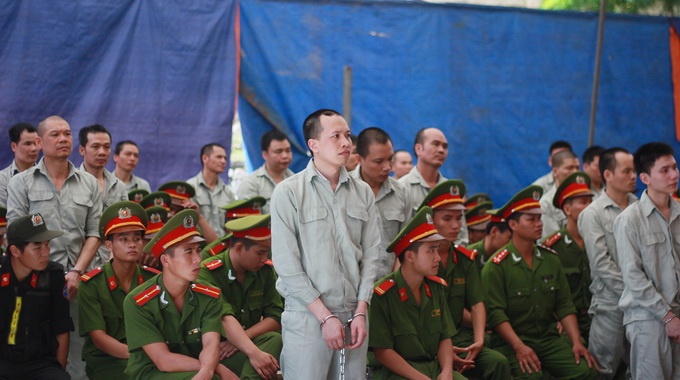 Các bị cáo trong phiên tòa phúc thẩm xét xử về đường dây mua bán hơn 4.400 bánh heroin.