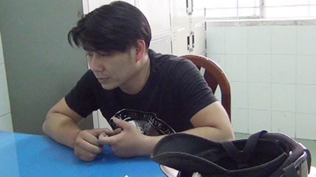 Hà Banh tại cơ quan công an.