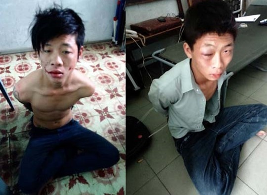 Nguyễn Vinh Hưng (ở trần) và La Chí Thành (bị bầm mắt khi đụng vào nhà dân), bị các “hiệp sĩ” cùng trinh sát hình sự đặc nhiệm bắt nóng.