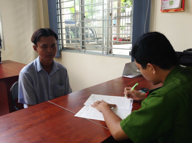 Kim Thái Đạt tại cơ quan công an.