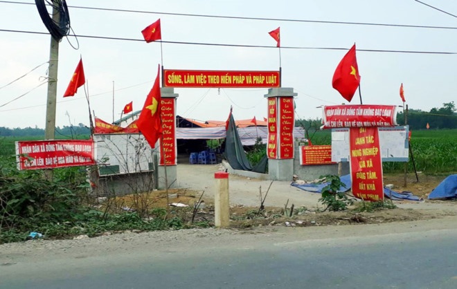 14 can bo sai pham lien quan dat dai o Dong Tam hau toa hinh anh