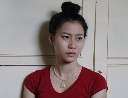 Nu giam doc xinh dep vuong vao duong day pham toi hinh anh