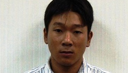 Long tại cơ quan điều tra.