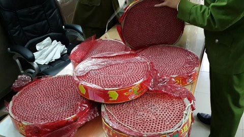 Men rung dua nua tan phao no Trung Quoc ve ban Tet hinh anh
