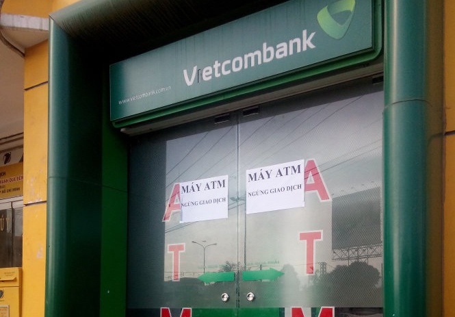 Dung may han cat hoc dung tien ATM lay 1,4 ty dong hinh anh