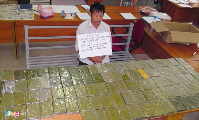 Nguyễn Văn Trình bị bắt cùng hơn 100 bánh heroin.