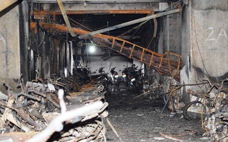 14 toa chung cu cua ong Than mat an toan chay no hinh anh