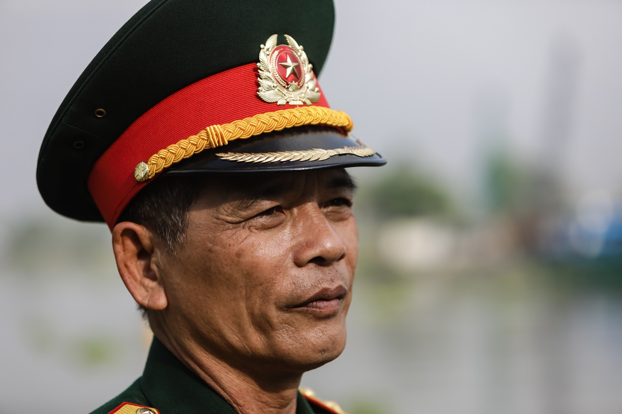 Nguoi ban phat B40 mo tran danh cau Rach Chiec truoc cua ngo Sai Gon hinh anh