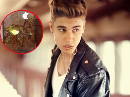 Justin Bieber nem 20 qua trung sang nha hang xom hinh anh