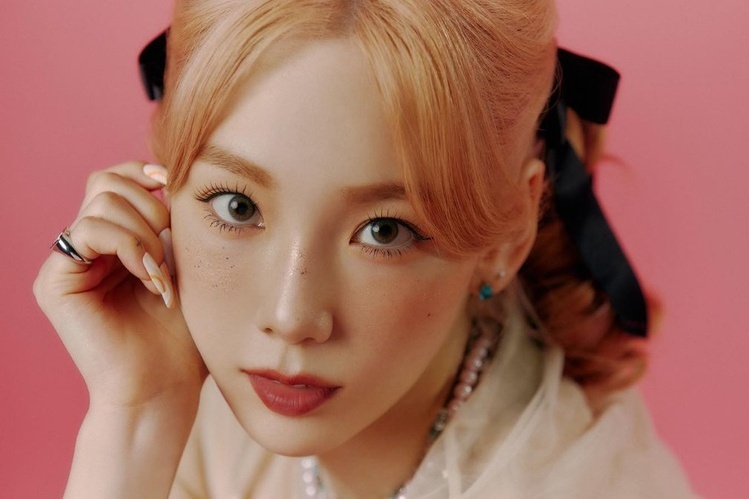 Mau thuan giua Taeyeon (SNSD) va Wiz Khalifa hinh anh