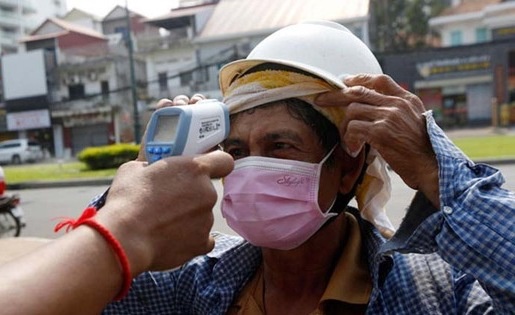 Phnom Penh thi diem dieu tri benh nhan Covid-19 trieu chung nhe o nha hinh anh