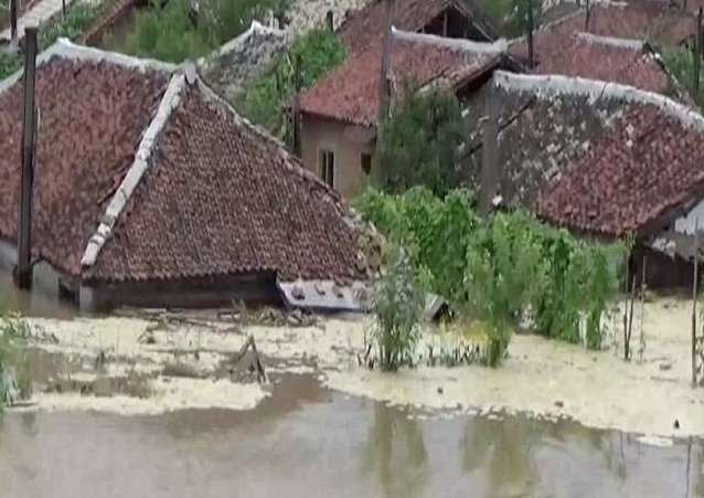 Hon 1.000 ngoi nha o Trieu Tien bi hu hai do lu lut hinh anh