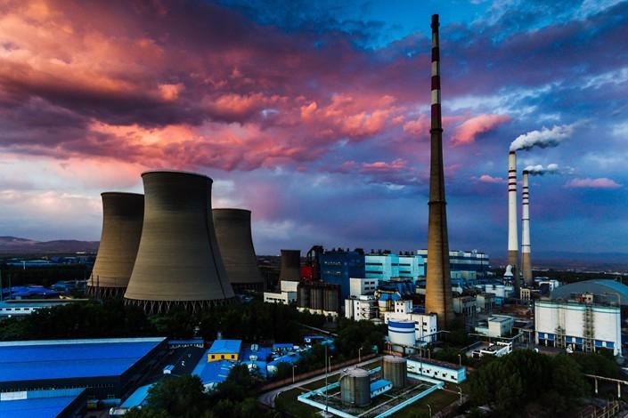 Trung Quoc chat vat tim loi ra cho khung hoang nang luong hinh anh