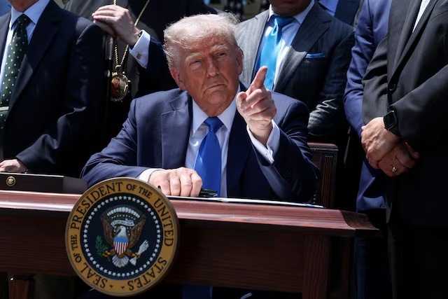 Ong Trump vat lon de giai thich khi kinh te My tang truong am hinh anh