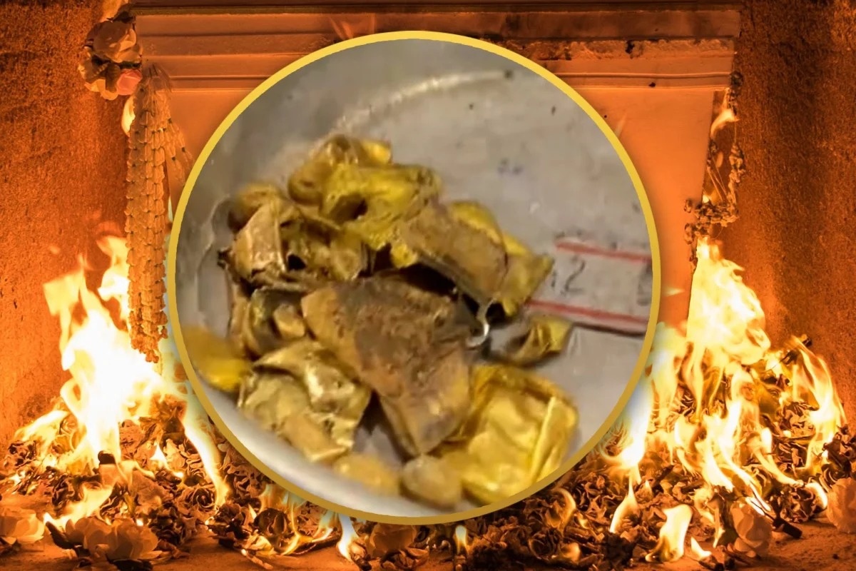 Nhan vien nha tang le gom rang vang tu tro cot de duc thanh thoi hinh anh