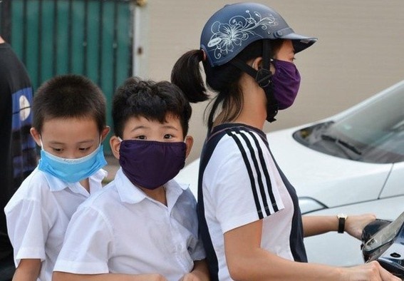 Cach dung khau trang vai de chong virus corona hinh anh