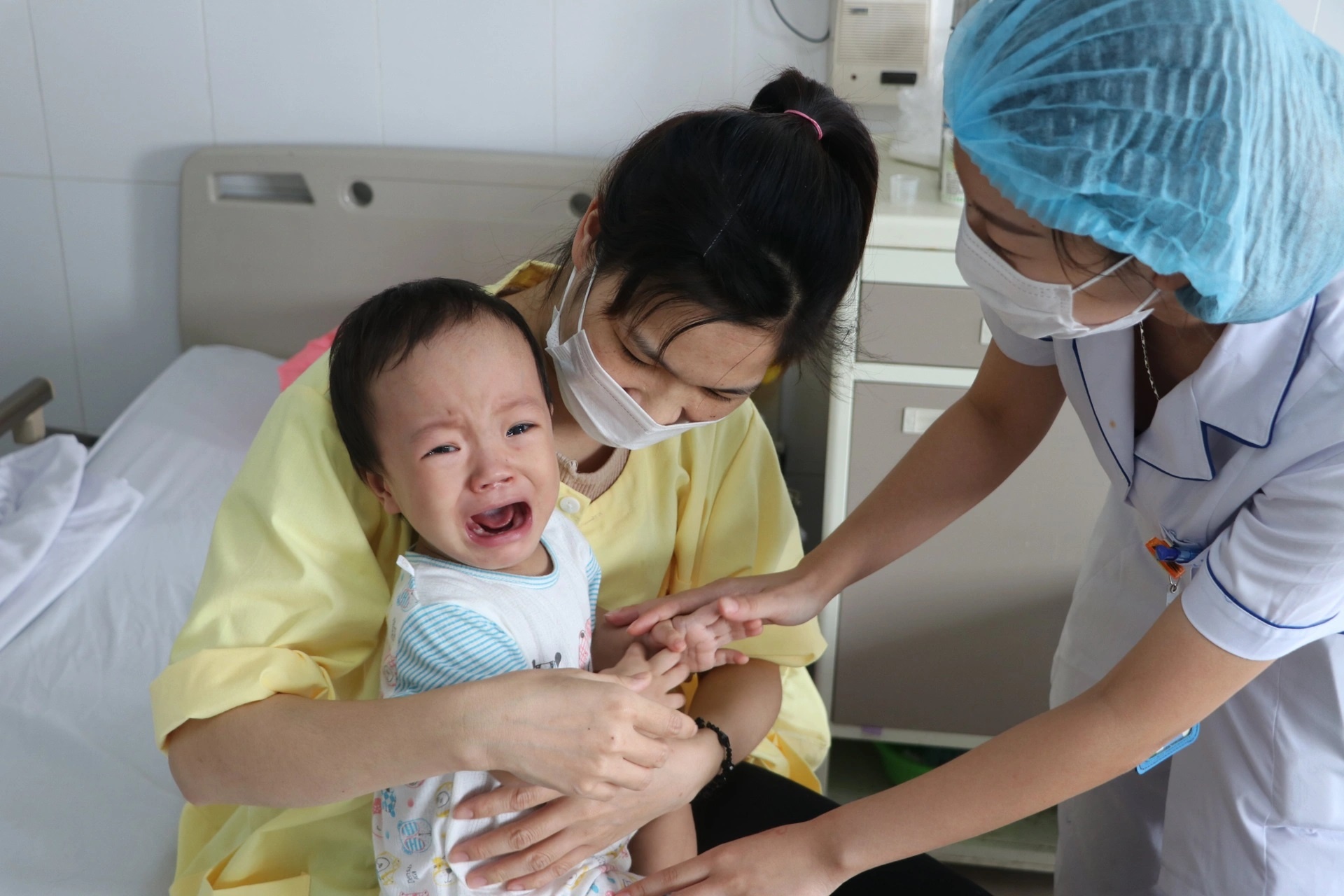 tiem chung vaccine dau mua khi anh 2