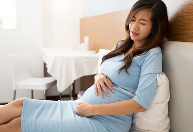 Nguoi phu nu dau thai o vi tri hiem gap hinh anh