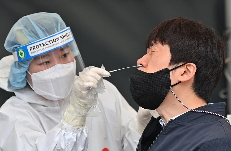 Trung Quoc 'tran an' ve nguy co benh duong ho hap do virus HMPV hinh anh