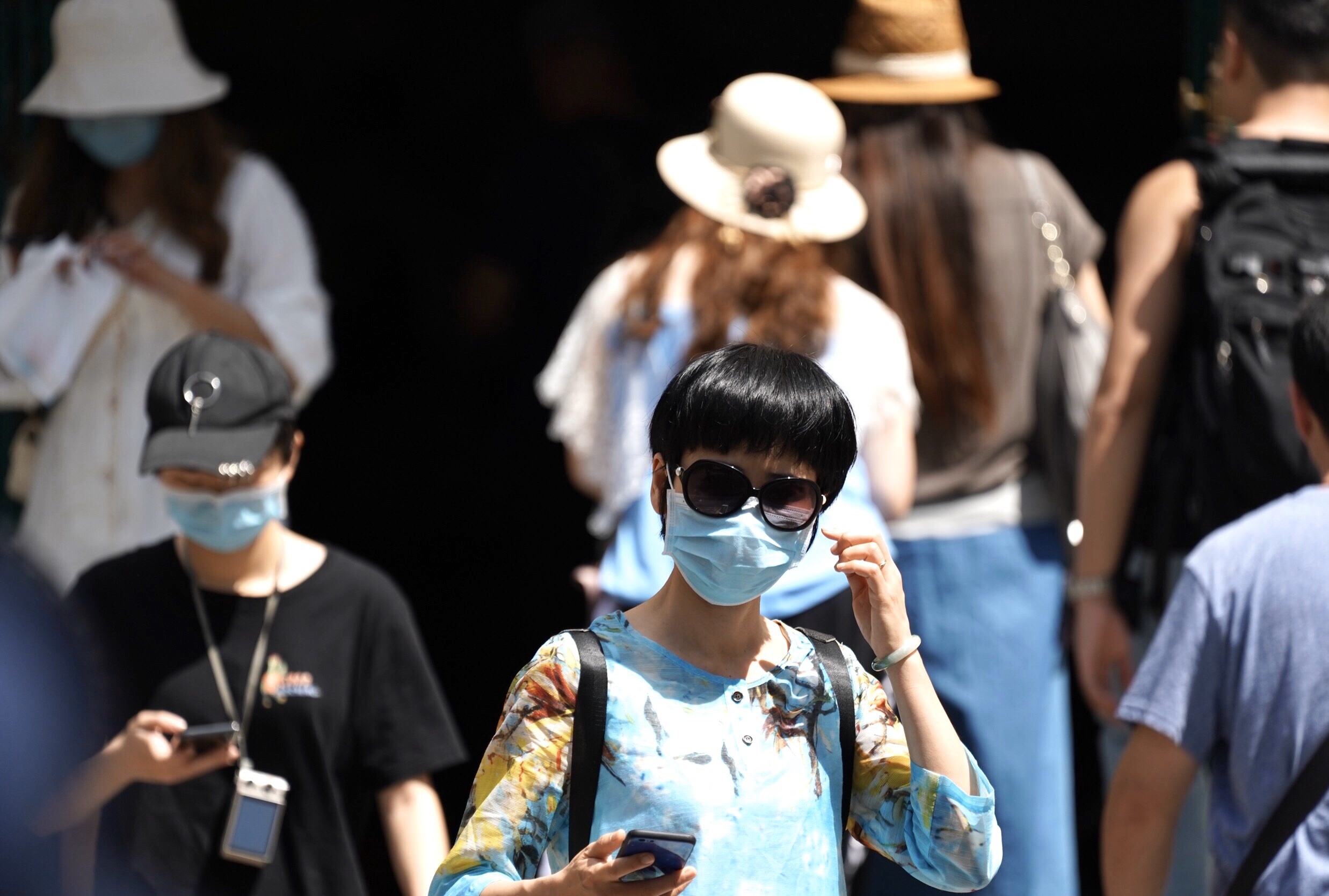 nguoi dan TP.HCM deo khau trang phong virus corona anh 9