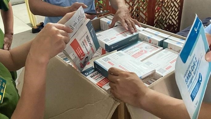 Canh bao thu doan loi dung dich Covid-19 de lua dao hinh anh