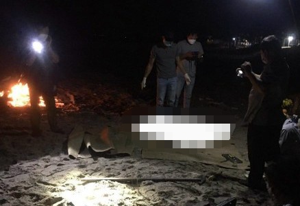 Thi the mat dau va tay chan troi dat vao bo bien Binh Thuan hinh anh