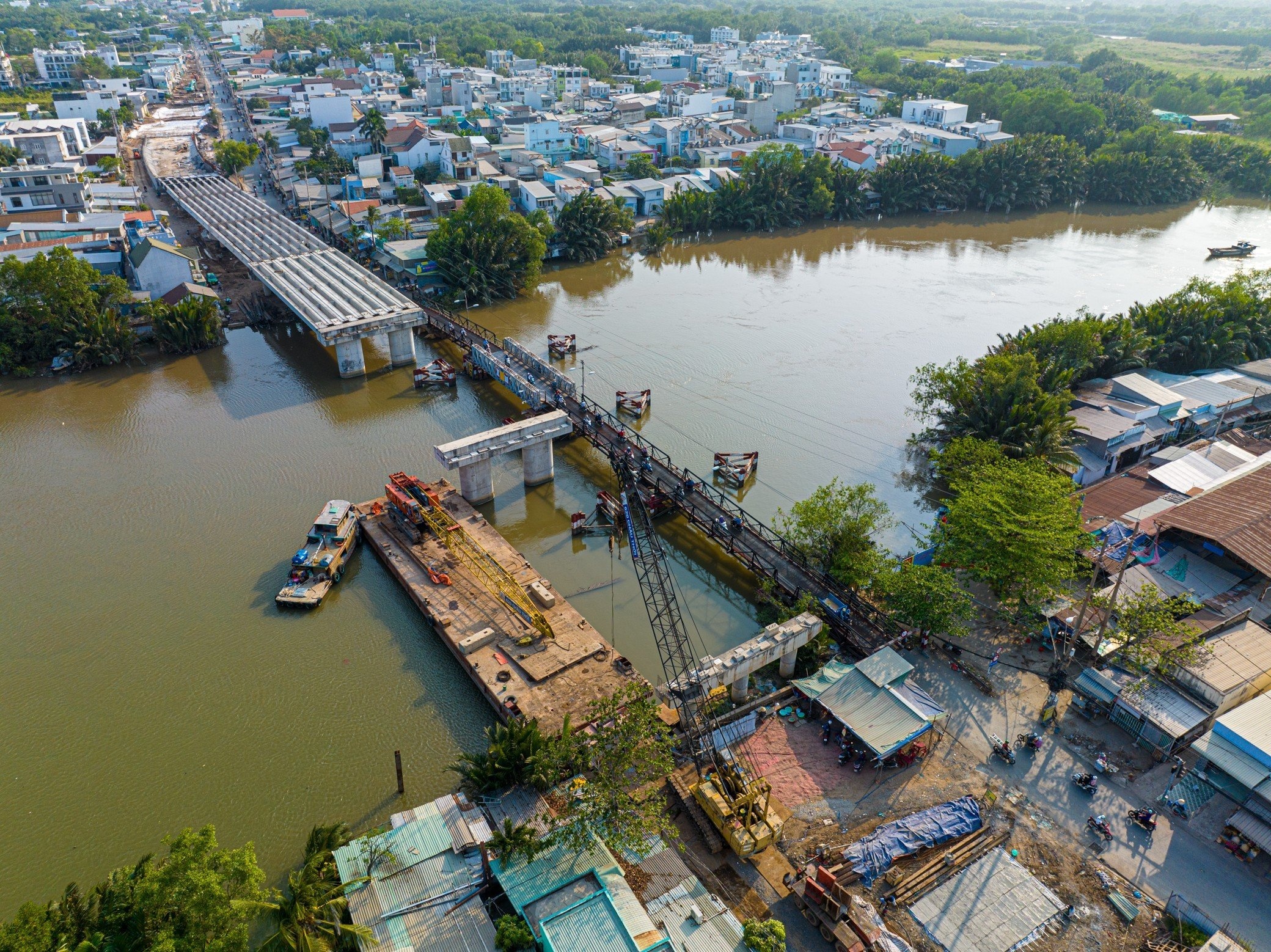 Cay cau duoc mong cho het 'loi hen' o cua ngo phia nam TP.HCM hinh anh