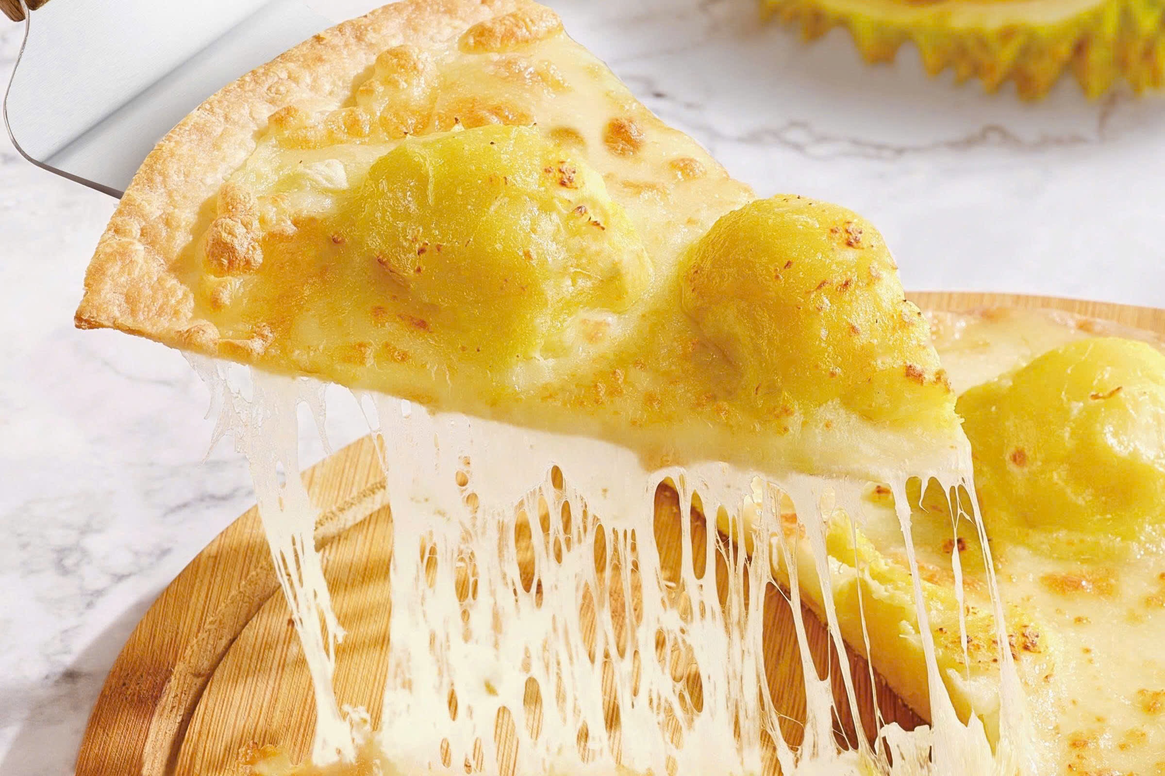 Cong ty Trung Quoc thu 100 trieu USD tu pizza sau rieng hinh anh