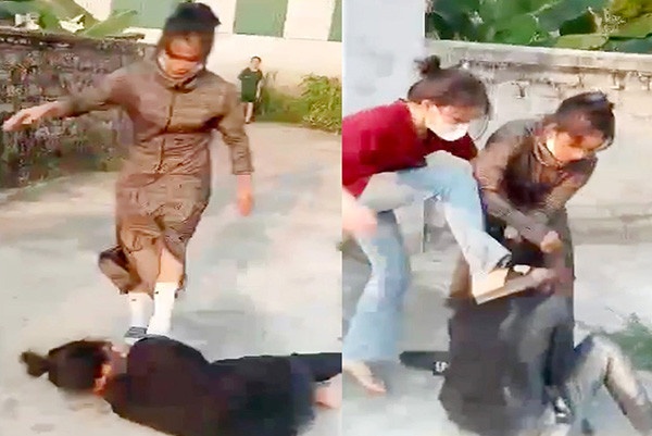 Hai nu sinh lop 8 bi danh hoi dong truoc cong nha nguoi dan hinh anh