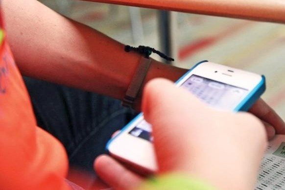 5 thi sinh Ha Noi mang dien thoai vao phong thi lop 10 hinh anh