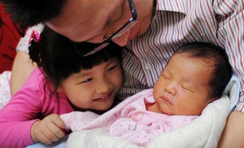 Trung Quoc se cho phep moi gia dinh co 3 con hinh anh