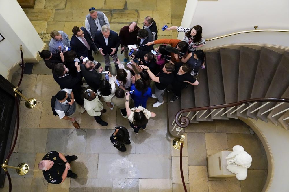 Dang sau thoa thuan tranh vo no cua My hinh anh